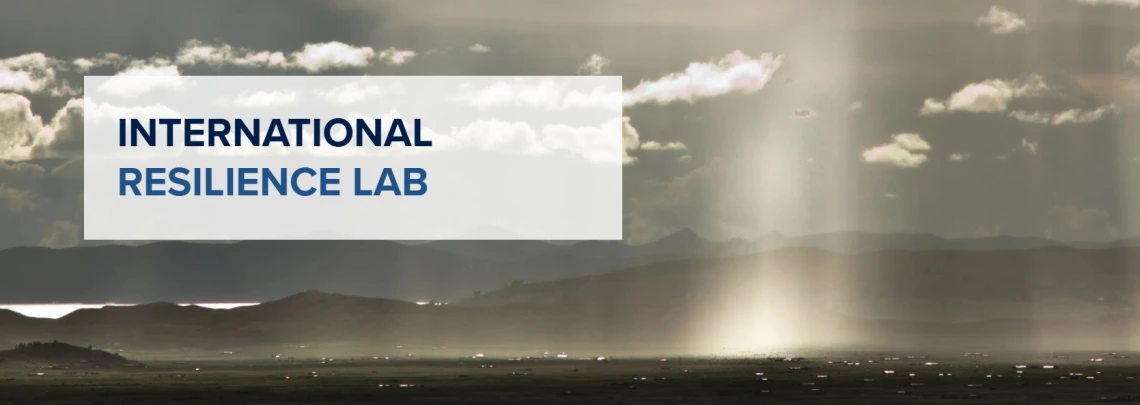 A grey sky with the text "International Resilience Lab".